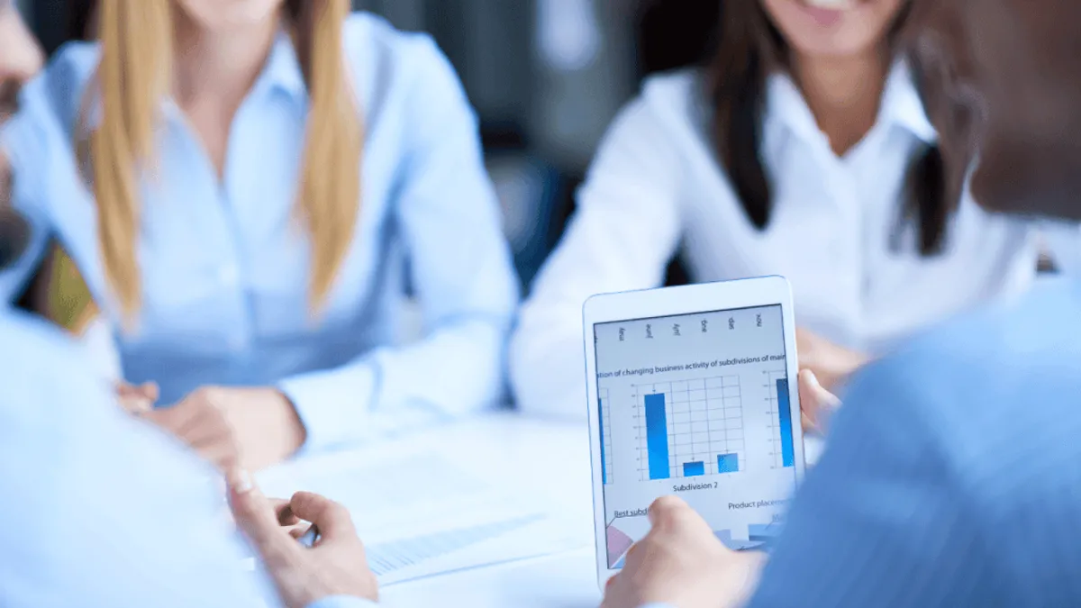 Marketing teams checking out ad campaigns made with ai powered ads