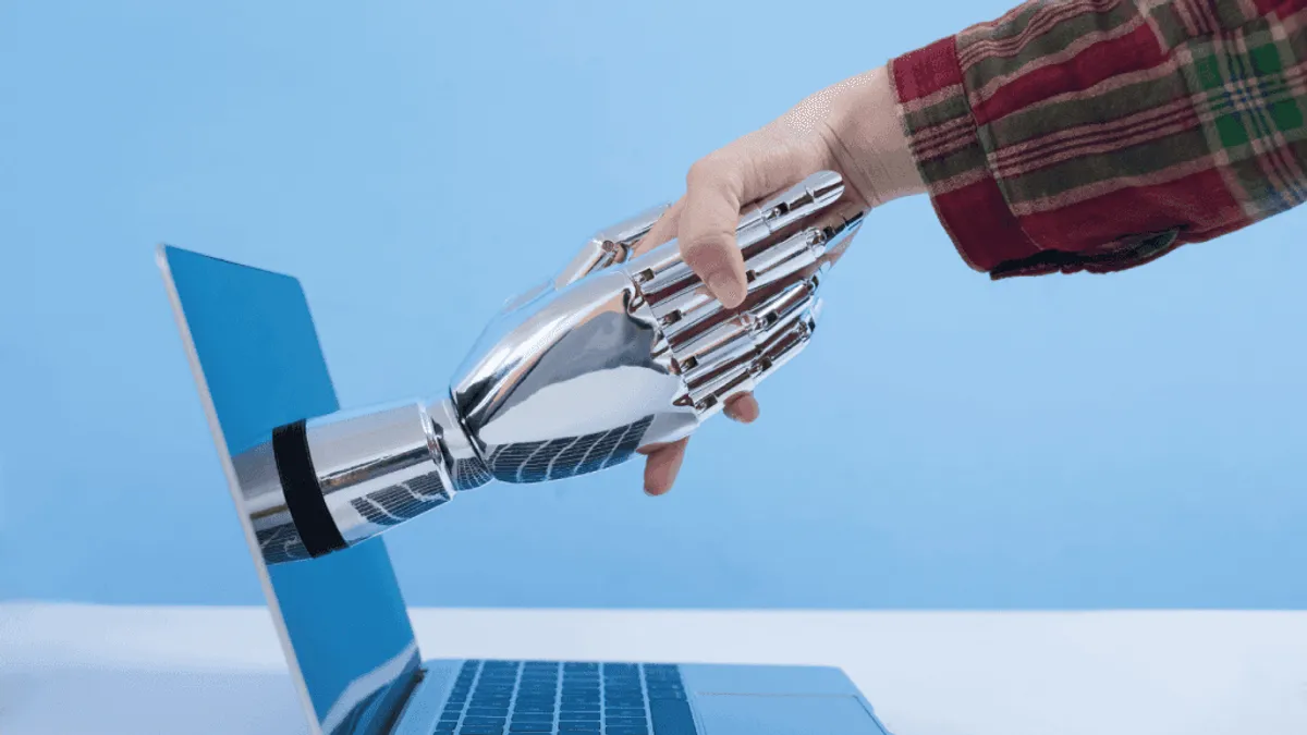 A sales person and AI shaking hands along with the conclusion of their sales training program
